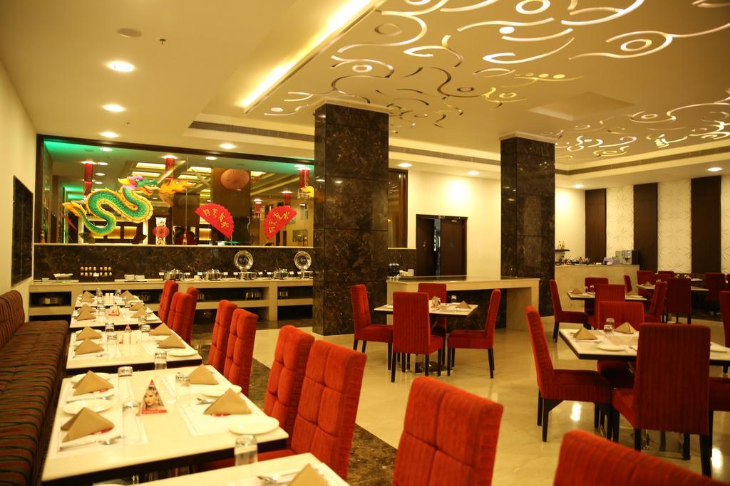 Ramada Jamshedpur Bistupur Hotel Exterior photo